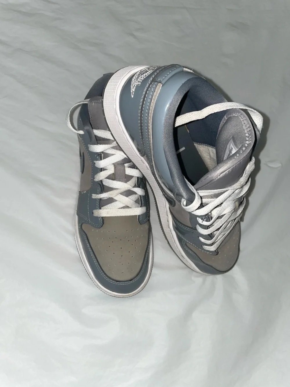 Nike Air Jordan 1 Low SE sneakers in a Medium Grey/Cool Grey